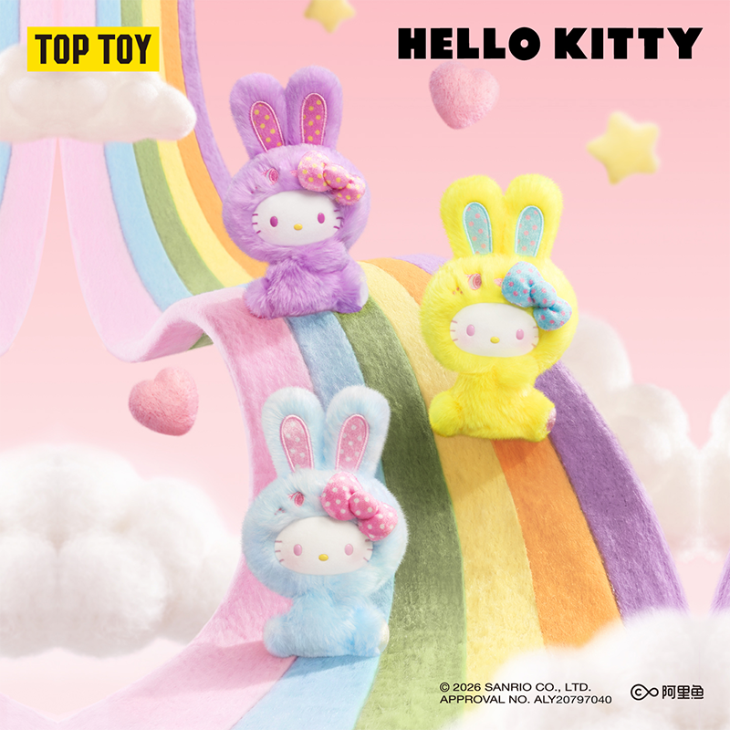 Three Hello Kitty bunny plush toys in pastel colors are arranged on a rainbow-shaped carpet with clouds and stars in a pink studio scene. The text 'TOP TOY' appears in the top left, 'HELLO KITTY' in the top right, and Sanrio copyright text appears at the bottom.