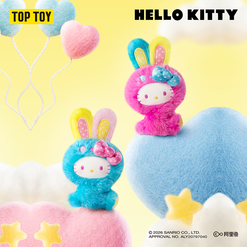Two Hello Kitty plush toys in fuzzy bunny outfits, one bright blue and one bright pink, displayed on pastel cloud-shaped props against a pale yellow background with balloons and the text 'HELLO KITTY' and 'TOP TOY'.