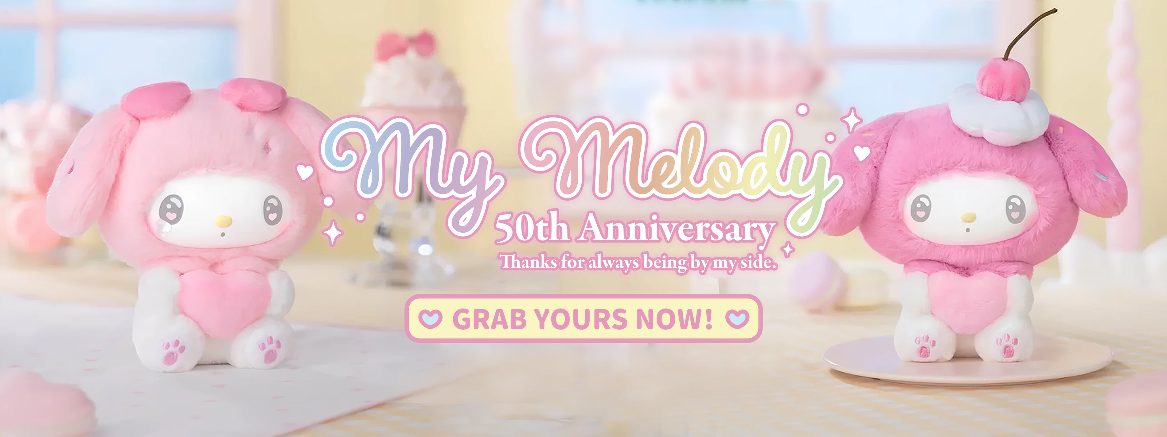 Two TOPTOY pink plush toys with bunny ears and a cherry on top, celebrating My Melody's 50th Anniversary.