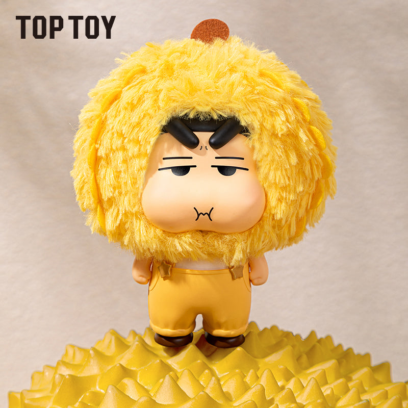 Toy figure with yellow fur and outfit on a beige background, branded 'Top Toy'.